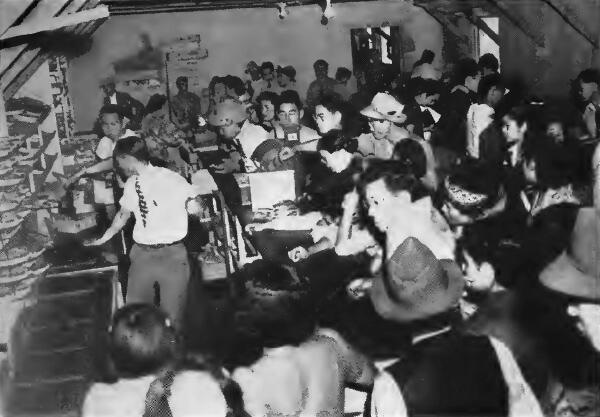 A busy hour in one of the three canteens at Santa Anita (California) Assembly Center