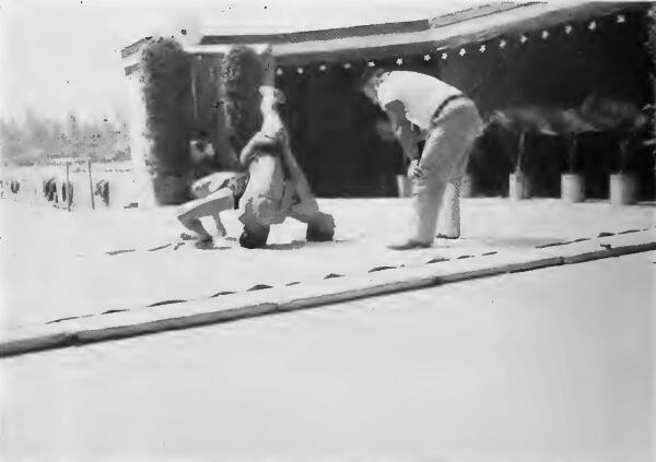Action in an American style wrestling match at Santa Anita (California) Assembly Center