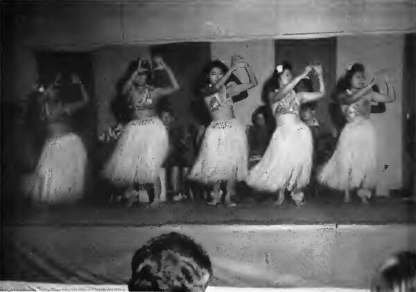 Japanese-Hawaiian hula dancers on an improvised stage during one of the frequent talent shows at Santa Anita (California) Assembly Center