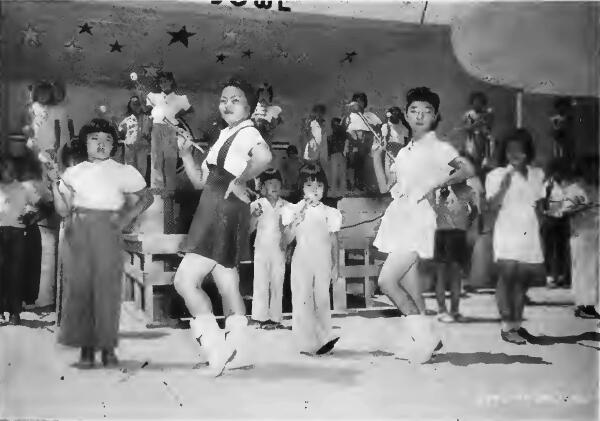 Majorettes of all sizes and ages in drills at Fresno (California) Assembly Center