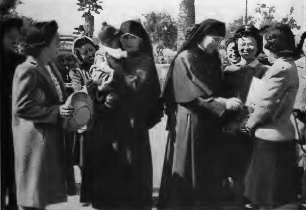 Maryknoll Sisters visiting their former wards at Santa Anita (California) Assembly Center