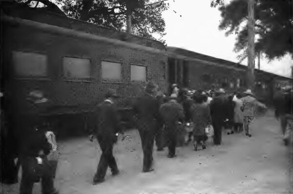 Evacuees boarding a special train at Santa Anita (California) Assembly Center enroute to a War Relocation Center